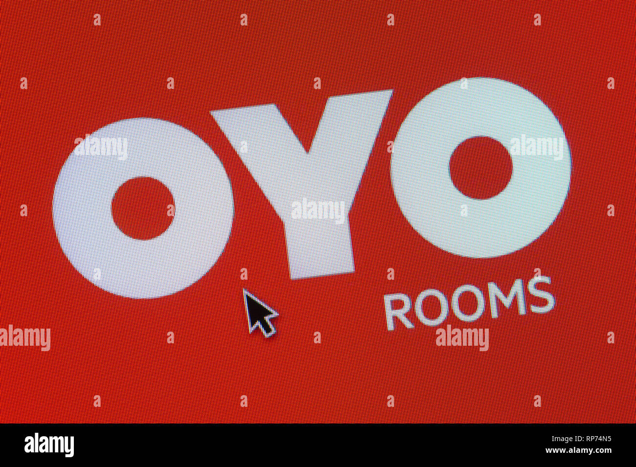 The logo of Oyo Rooms is seen on a computer screen along with a mouse ...