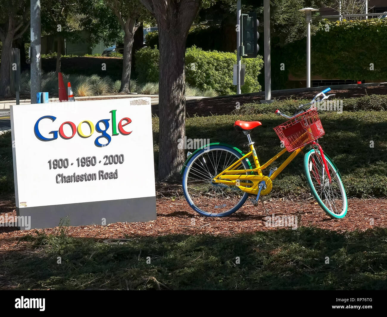 MOUNTAIN VIEW, CA, USA - AUGUST 28, 2015: close up of a sign and bicycle outside google headquarters building Stock Photo