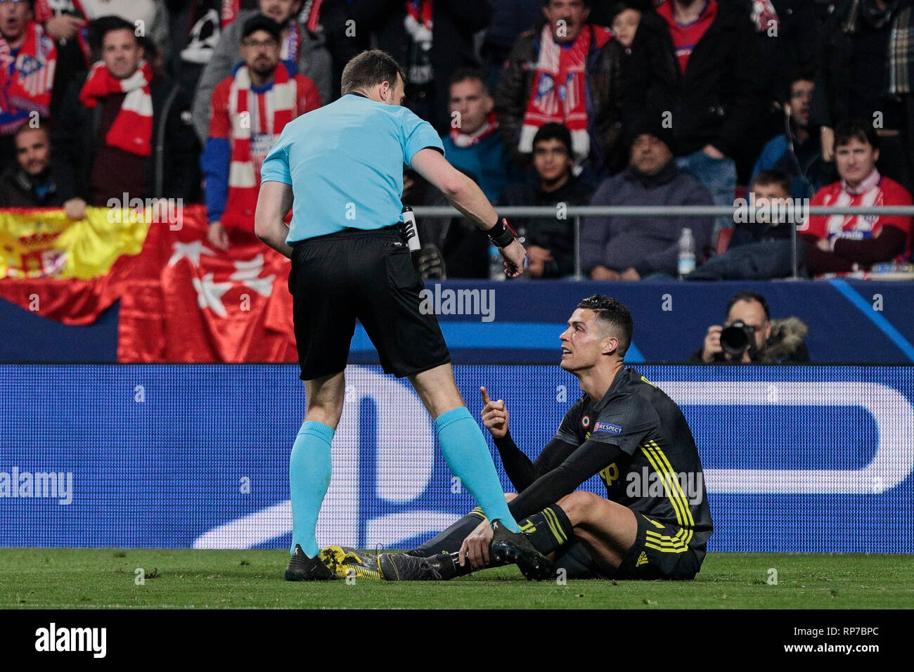 Juventus' Cristiano Ronaldo seen having words with the referee during the UEFA Champions League match, Round of 16, 1st leg between Atletico de Madrid and Juventus at Wanda Metropolitano Stadium in Madrid, Spain. Stock Photo