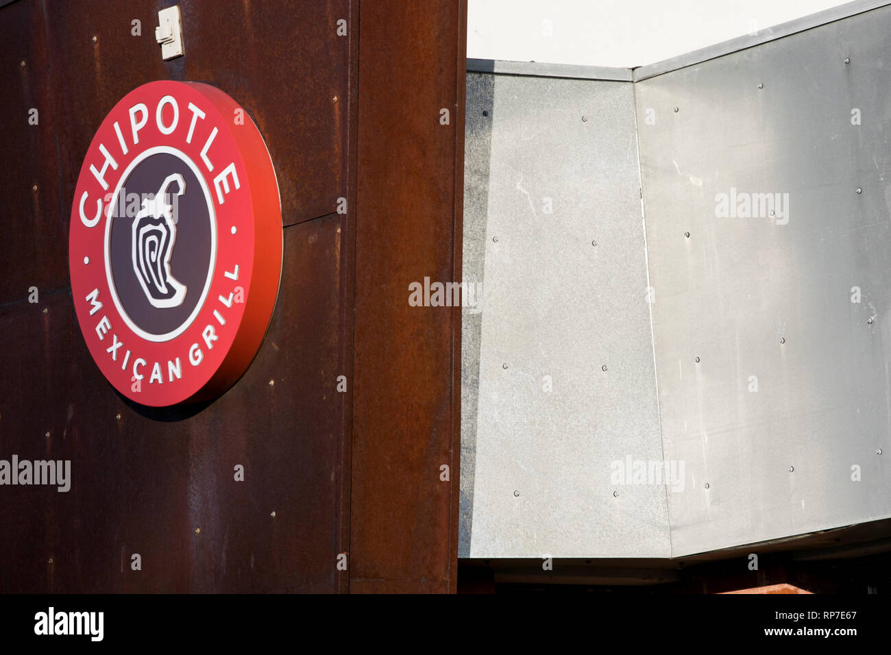 A logo sign outside of a Chipotle restaurant location in Fredericksburg, Virginia on February 19, 2019. Stock Photo