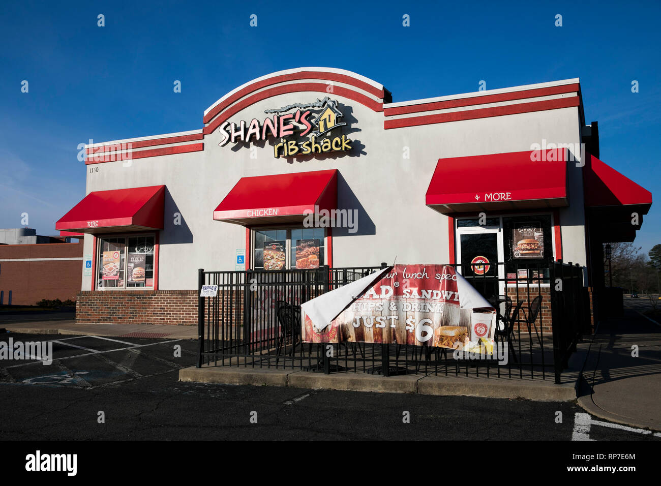 A logo sign outside of a Shane's Rib Shack restaurant location in Fredericksburg, Virginia on February 19, 2019. Stock Photo