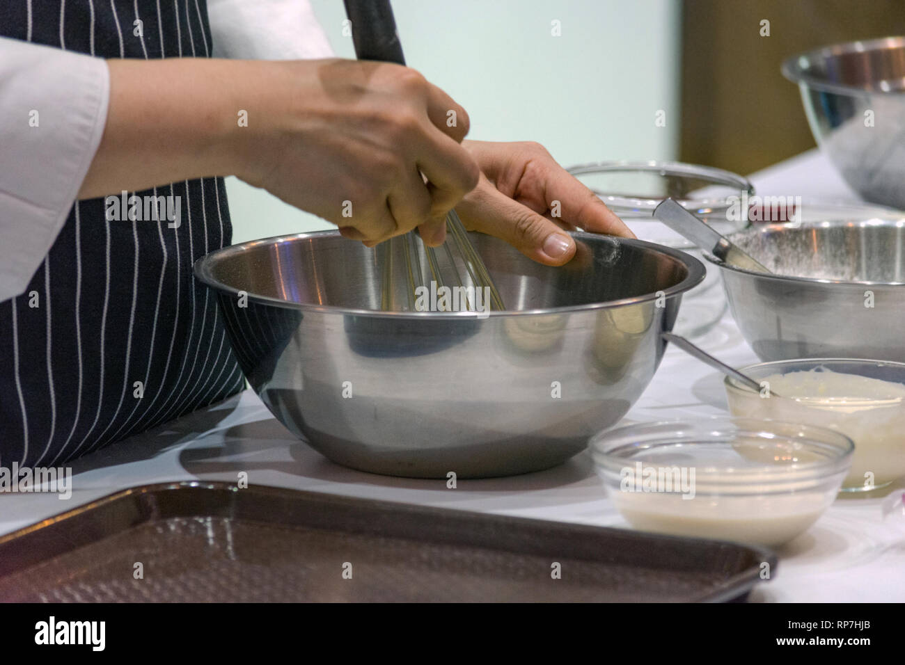 chef making dough on kitchen, Mixing Butter Milk Pastry Bakery, cook and cake Stock Photo