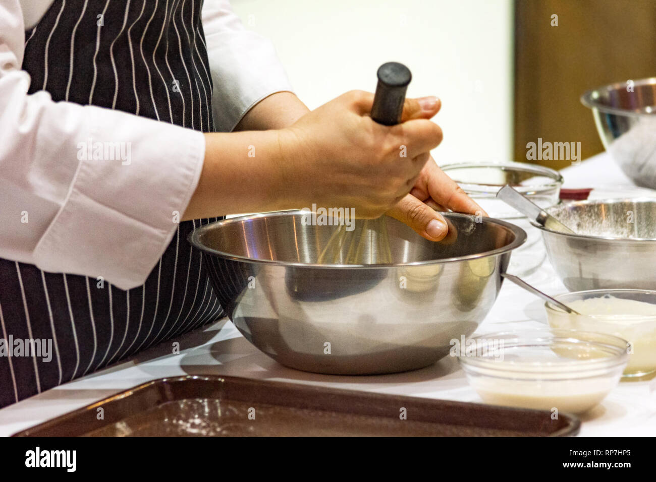 chef making dough on kitchen, Mixing Butter Milk Pastry Bakery, cook and cake Stock Photo