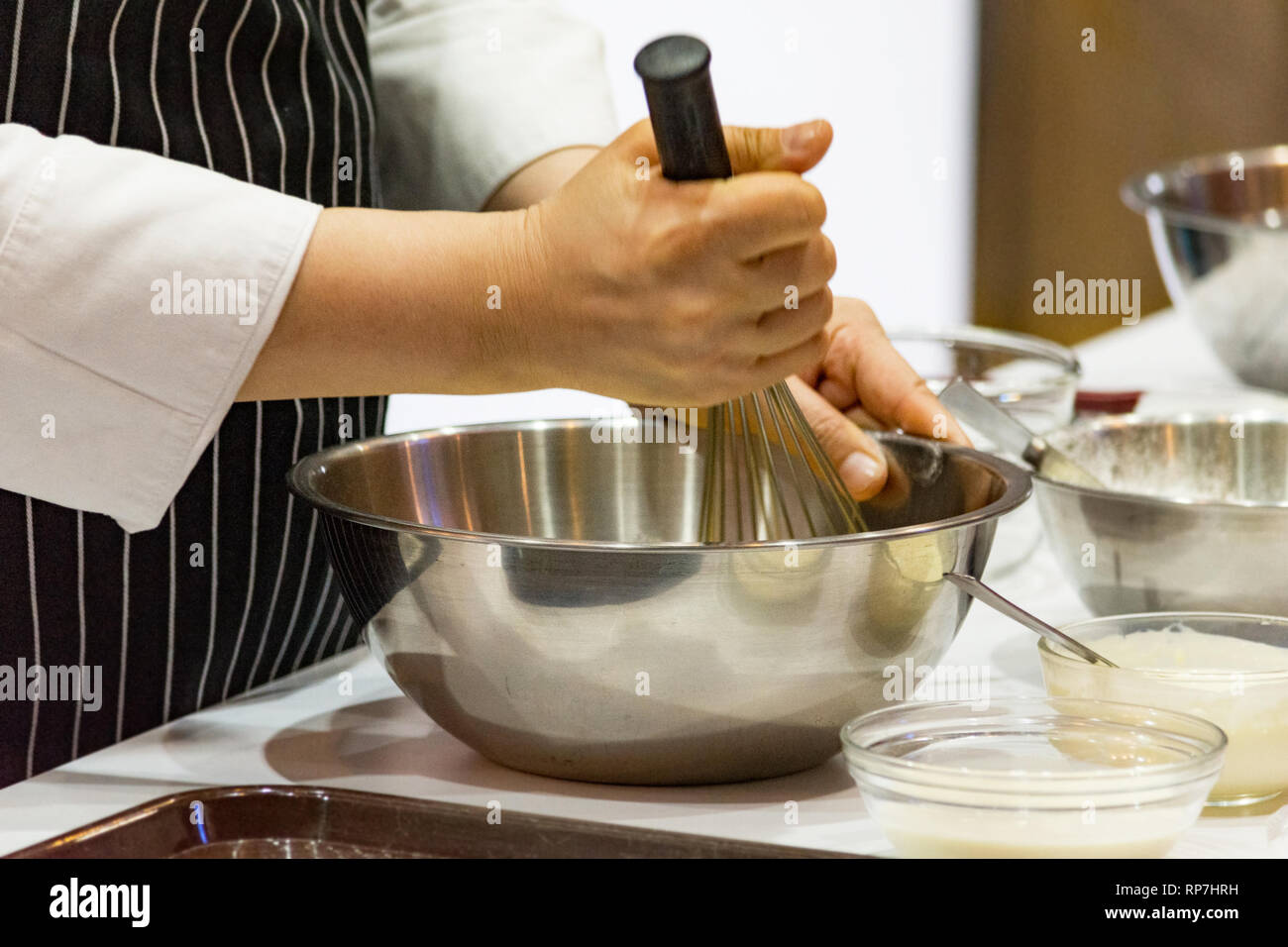 chef making dough on kitchen, Mixing Butter Milk Pastry Bakery, cook and cake Stock Photo