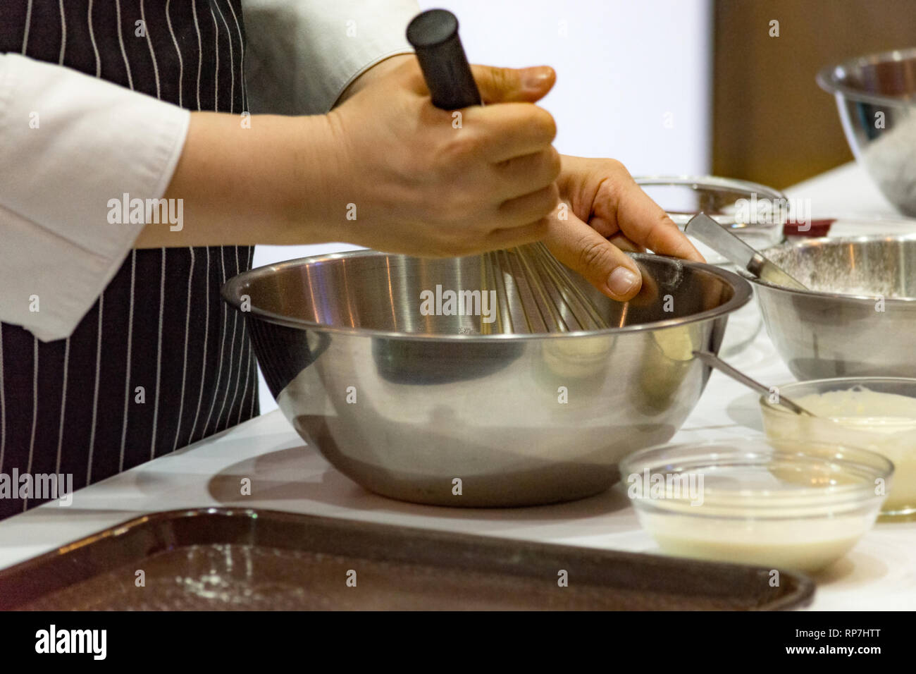 chef making dough on kitchen, Mixing Butter Milk Pastry Bakery, cook and cake Stock Photo