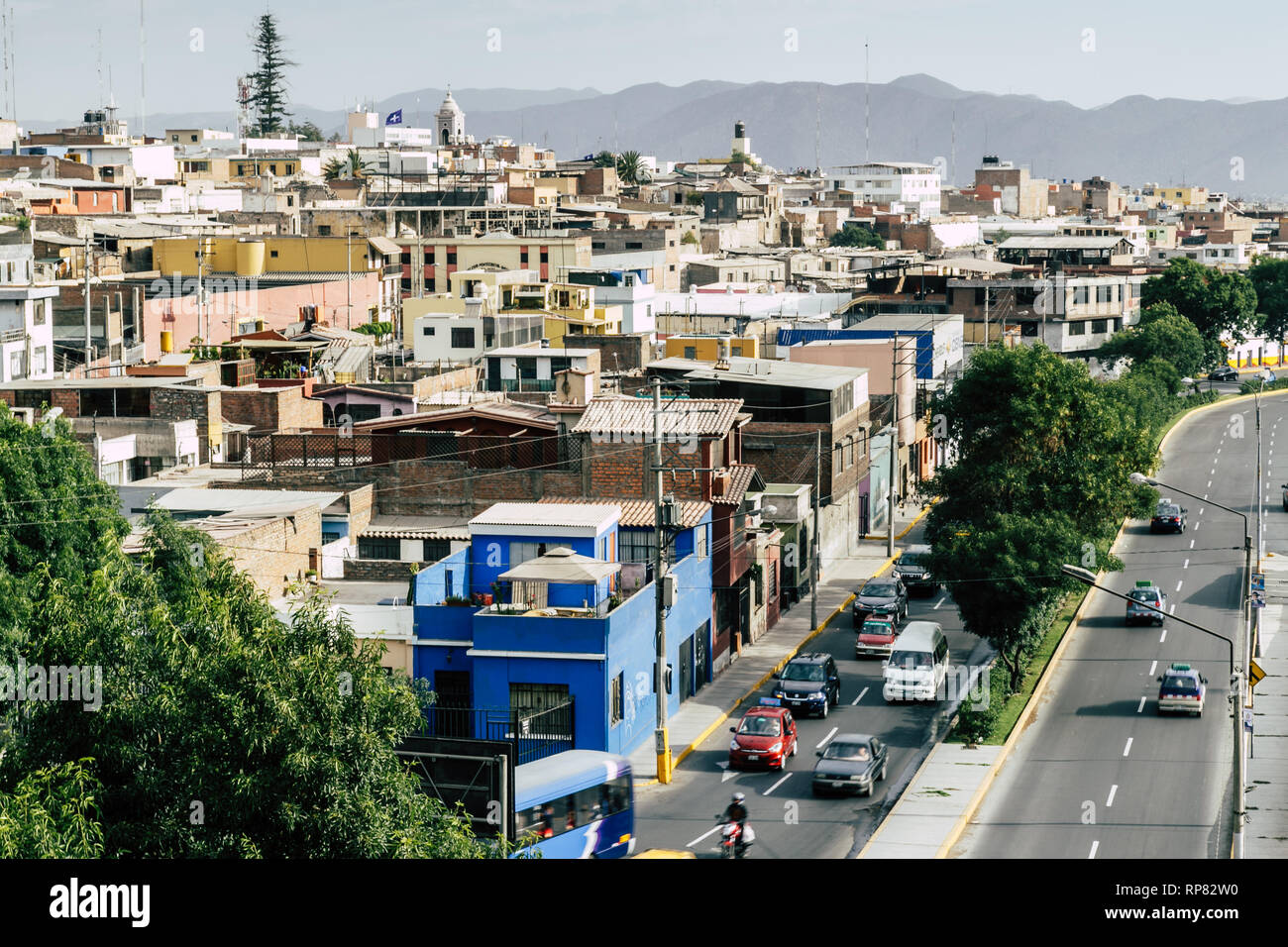 View of a neighbourhood with mountains in the background in Arequipa, Peru. Stock Photo