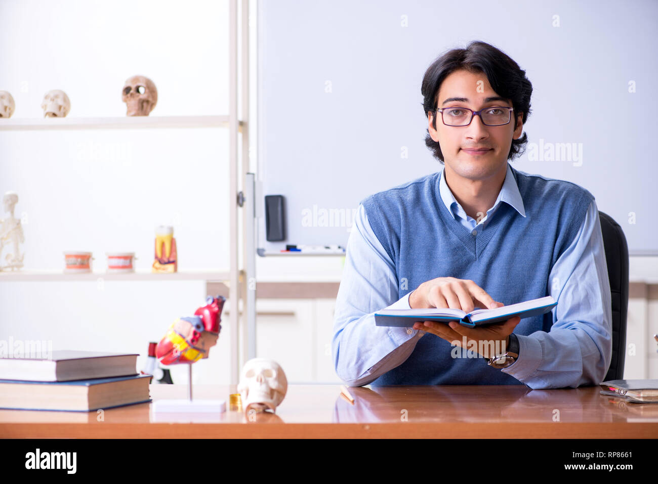 Young lecturer teacher teaching anatomy Stock Photo
