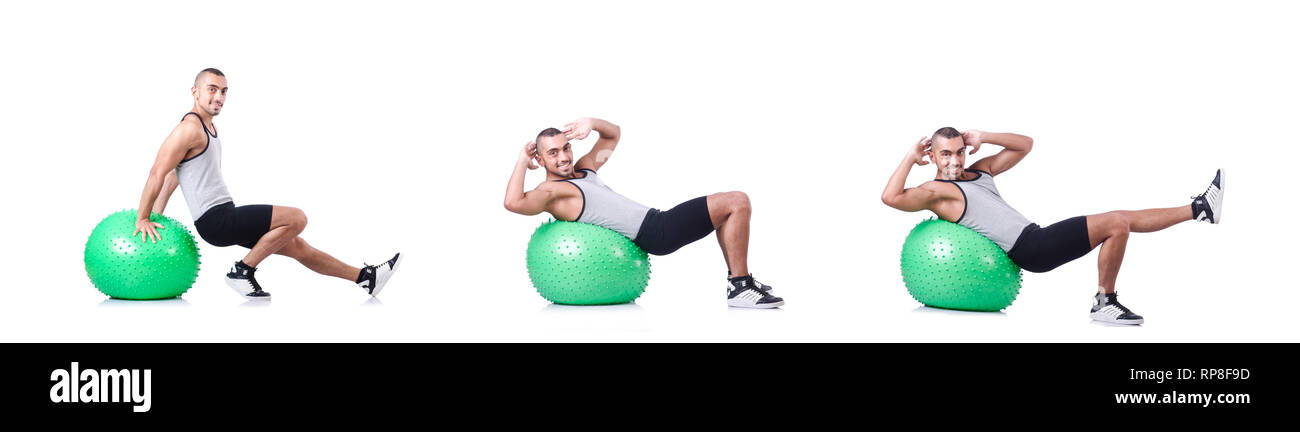 Man with swiss ball doing exercises on white Stock Photo - Alamy