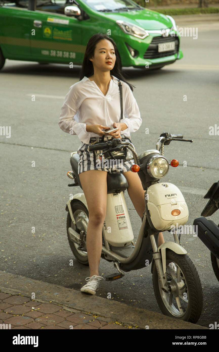 Girl with electrical scooter in Ho Chi Minh, Vietnam Stock Photo Alamy