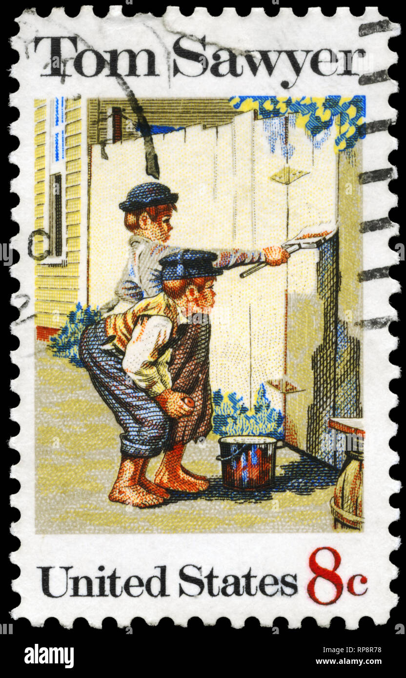 USA - CIRCA 1972: A Stamp printed in USA shows the painting 'Tom Sawyer', by Norman Rockwell (1894-1978), American Folklore Issue, circa 1972 Stock Photo