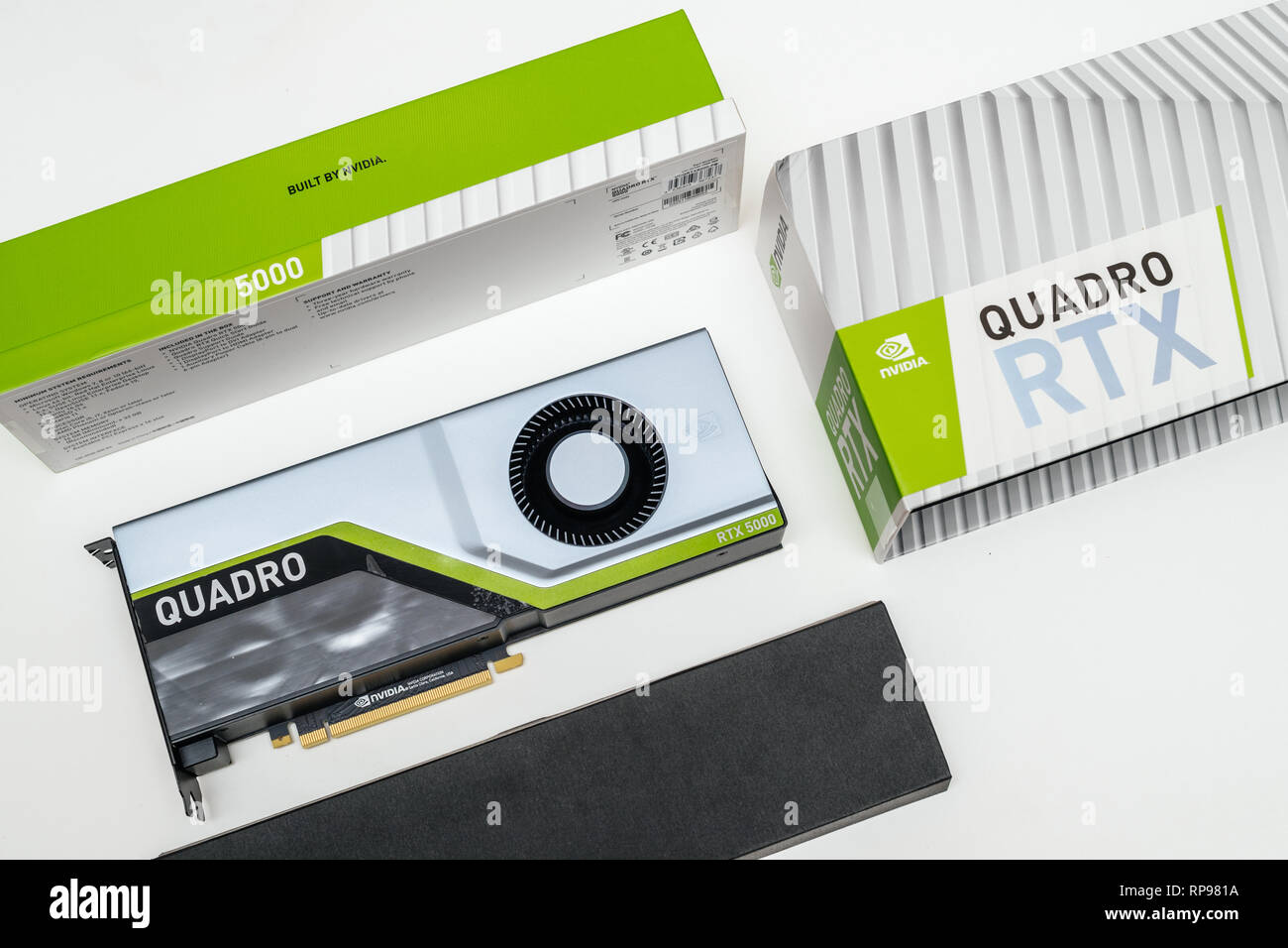 Paris, France - Feb 20, 2019: Unboxing of the latest Nvidia Quadro RTX 5000 workstation professional video card GPU for professional CAD CGI scientific calculations and machine learning  Stock Photo