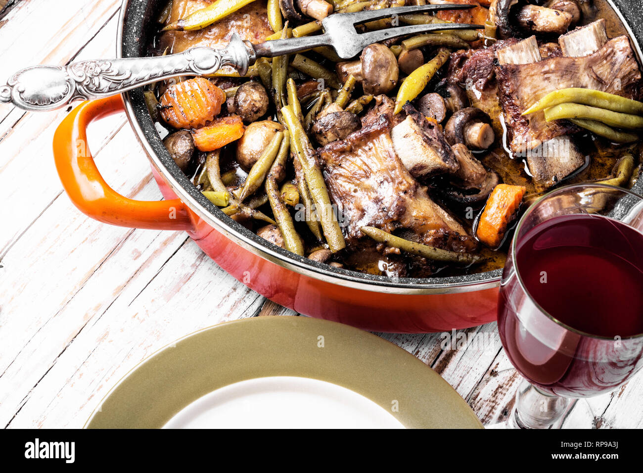 Cooking Stew meat in Burgundy or Beef Bourguignon.French cuisine Stock Photo