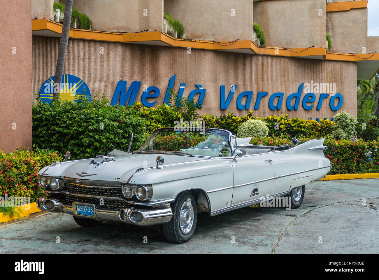 Varadero, Cuba - September 16, 2013: Vintage old classic American car in front of the Melia Varadero Hotel in Varadero, Cuba. Stock Photo