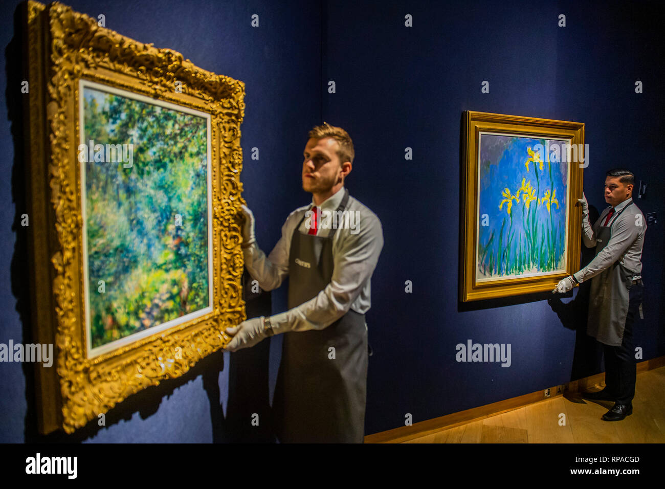 London, UK. 21st Feb, 2019. Claude Monet (1840-1926) Iris, est £4-6m (r) - Christie’s presents an exhibition of works from its upcoming Impressionist & Modern Art and The Art Of The Surreal Sales which will take place on 27 Feb at Christie’s King Street. Credit: Guy Bell/Alamy Live News Stock Photo