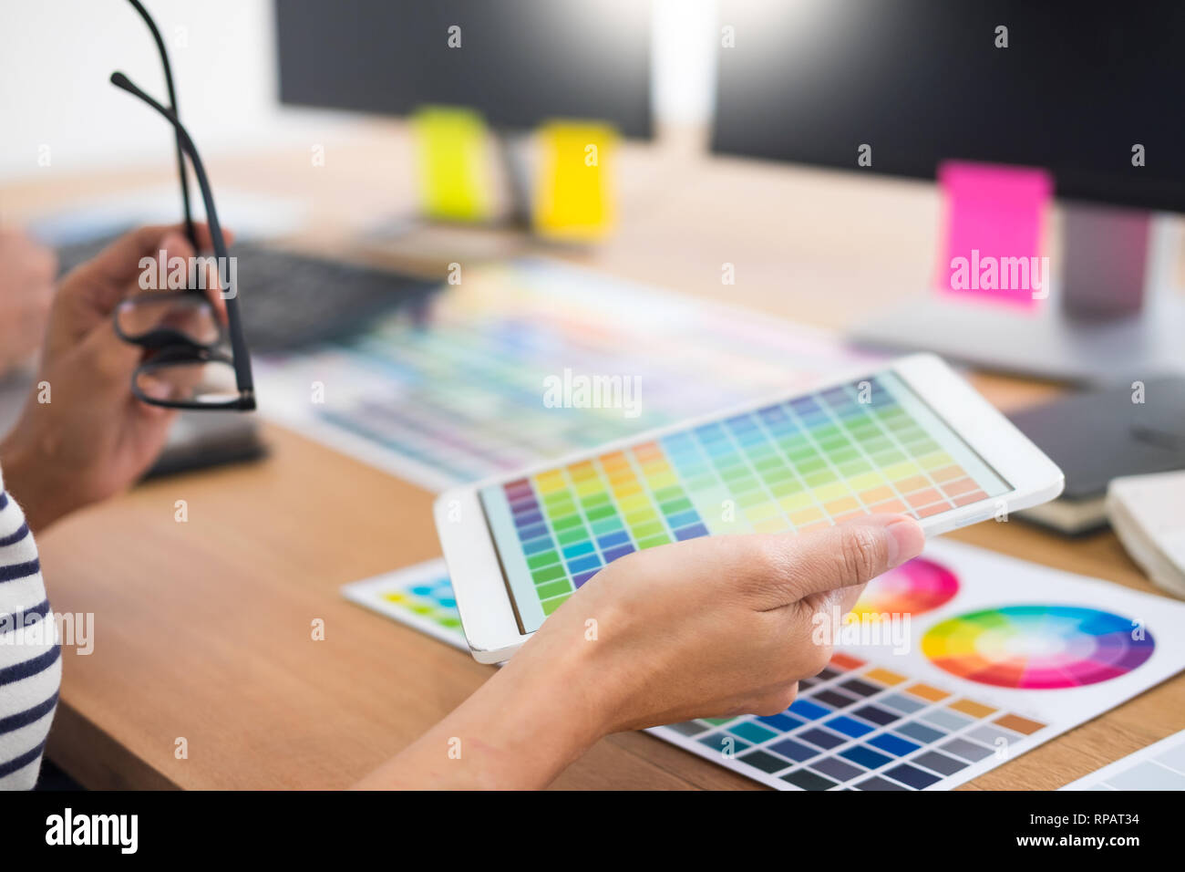 designer Editor at work drawing sketches a new project on graphic ...