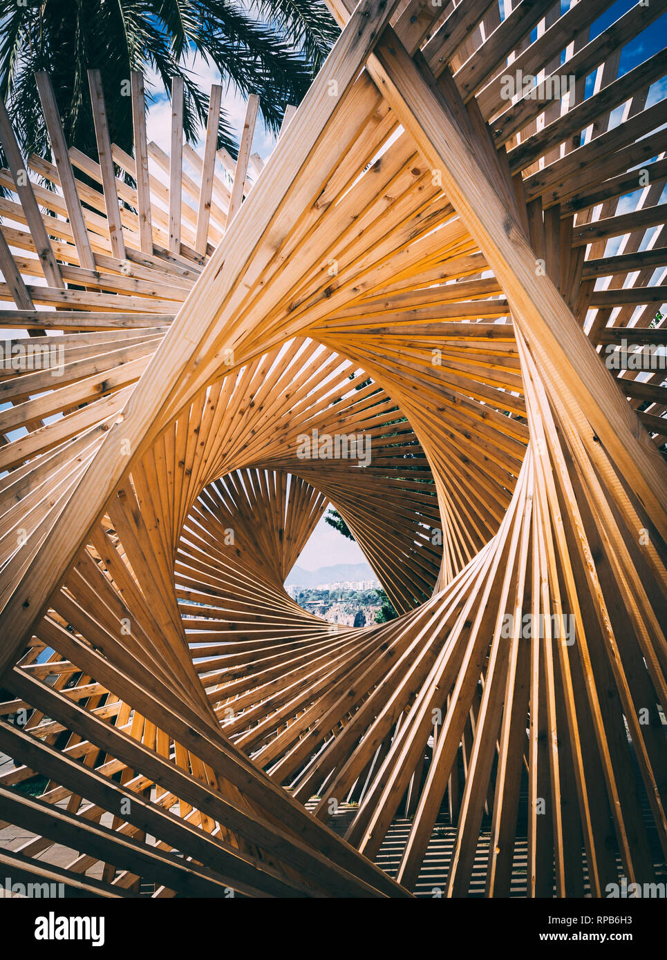 Wooden structure in tunnel shape. A look through long tunnel design. Perspective. Stock Photo