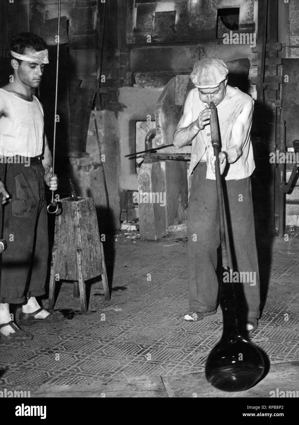 glassmaker in empoli, italy,  1952 Stock Photo