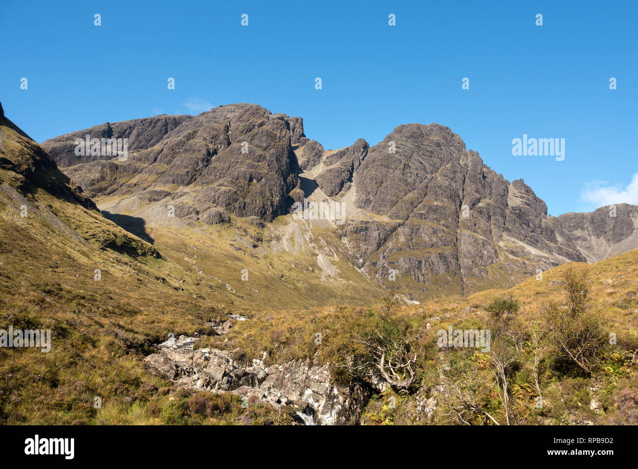 Bla Bheinn (left of centre) and Clach Glas (right of centre) in the Black Cuillin Mountains on the Isle of Skye, Scotland, UK Stock Photo