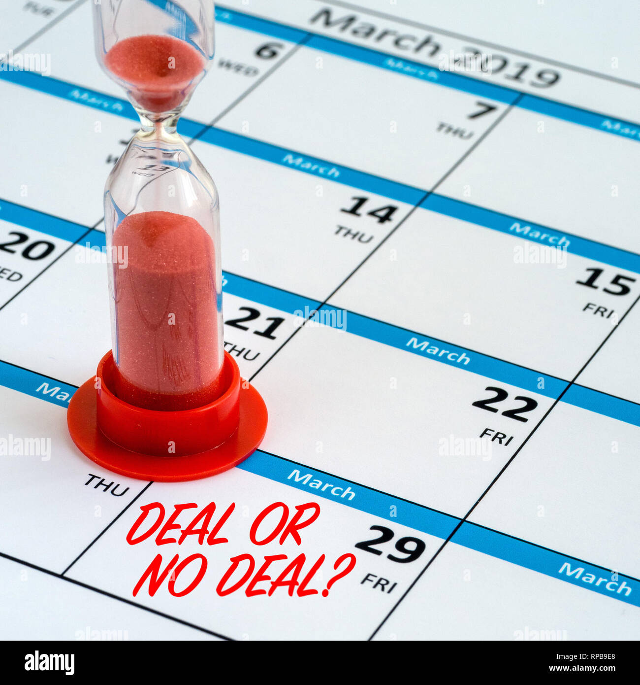 Concept image of time running out, or running down the clock to Brexit day deadline on 29th March 2019 shown by a calendar and hourglass timer. Stock Photo