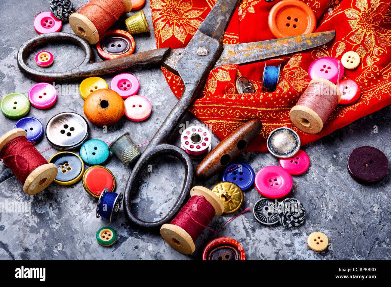 Composition with threads and sewing accessories - scissors, centimeter,  pins on yellow background. Stock Photo by ©nuclear_lily 236814992