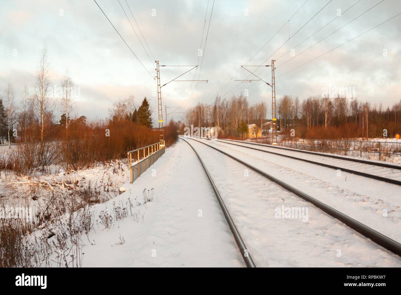 Snowy railroad view at winter morning in Kouvola, Finland. Stock Photo