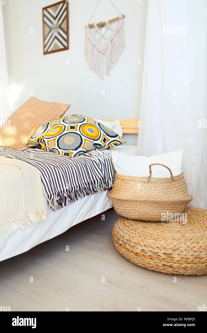 White And Beige Bedroom In Boho Style With Macrame On The