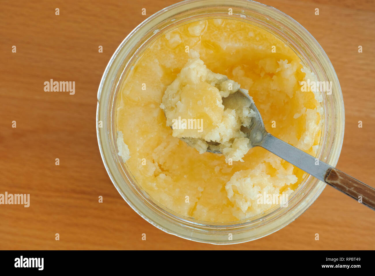 Download Yellow Coconut Oil In A Jar Close Up Stock Photo Alamy PSD Mockup Templates