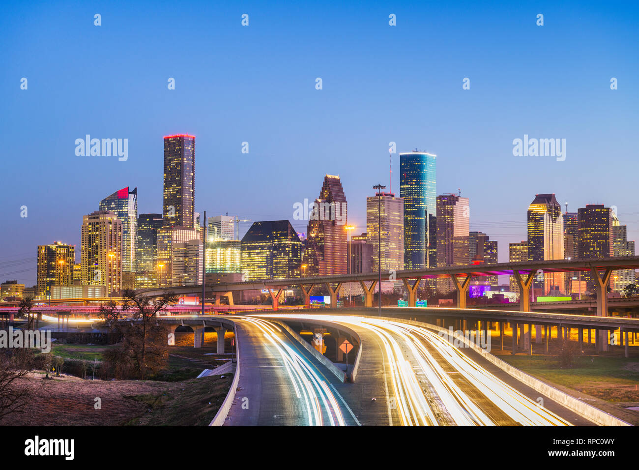 Houston, Texas, USA downtown city skyline and highway at dusk Stock