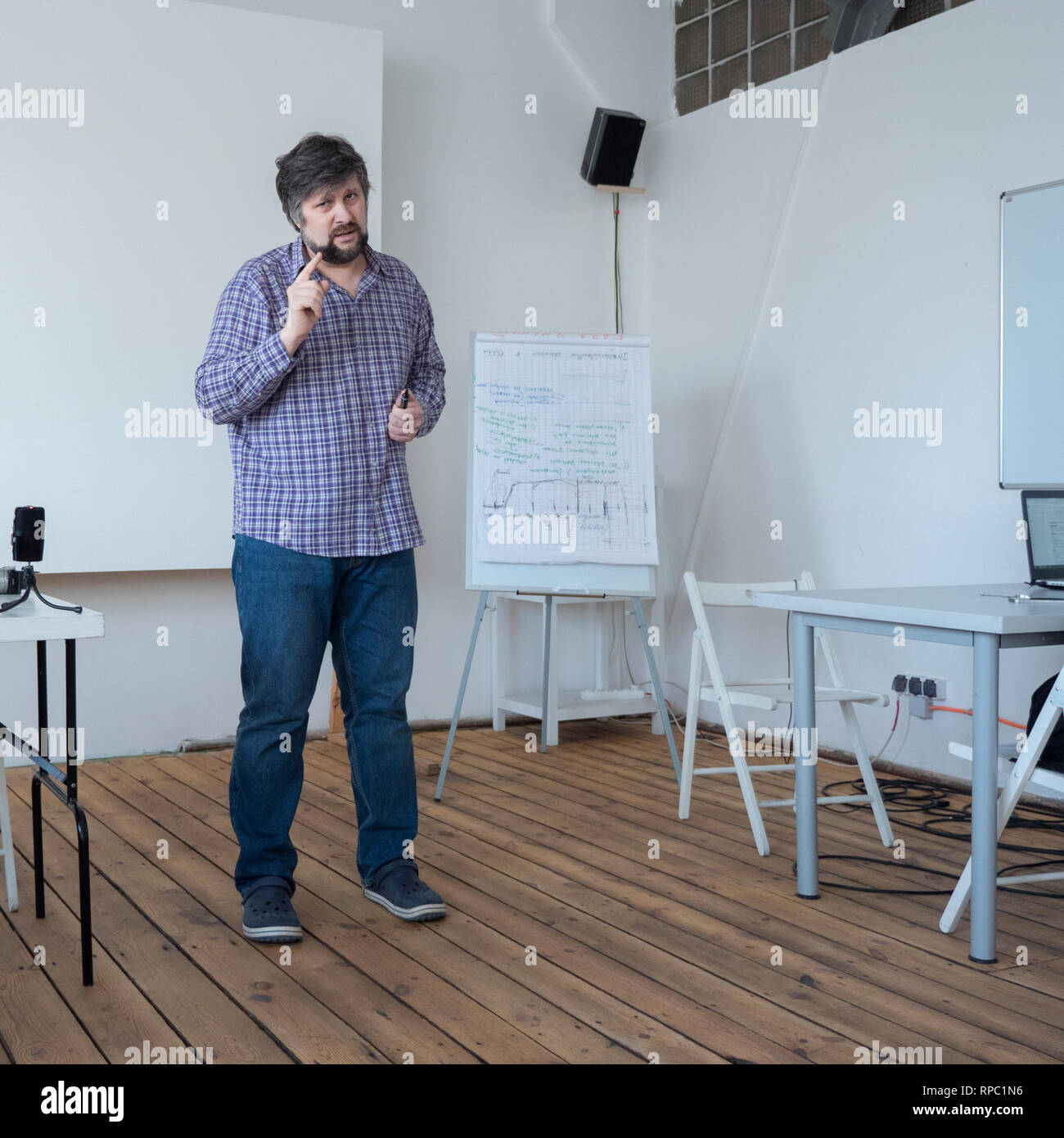 Male warning. Teacher warning students from mistakes. Man in casual