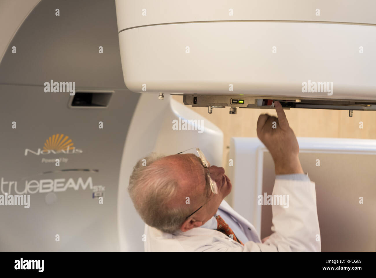 Auderghem, Brussels / Belgium - 02 18 2019: Doctor checking cancer therapy equipment with radiation threatment in the CHIREC hospital Stock Photo