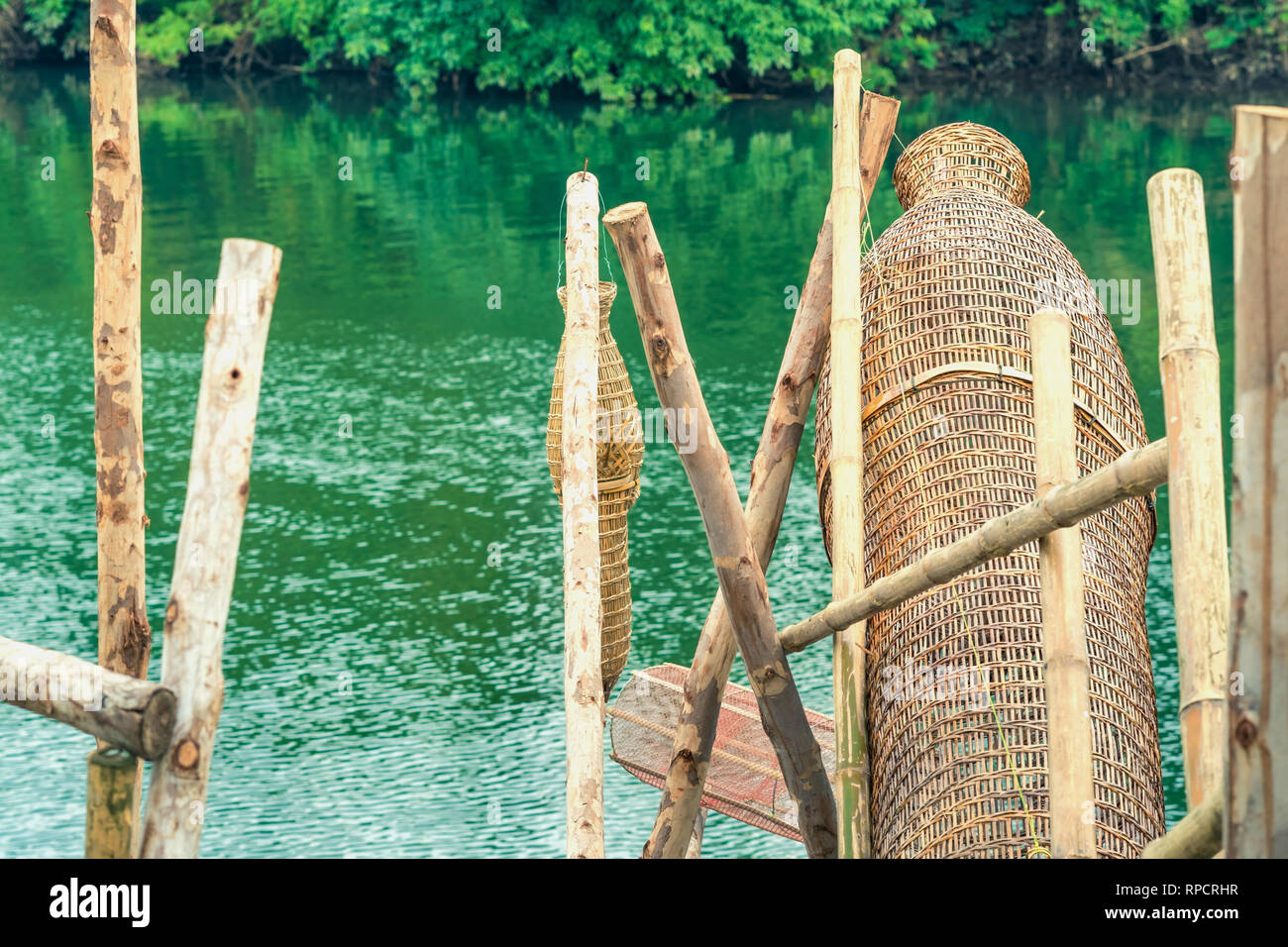 Ancient bamboo fish trap equipment of countryside, Thailand Stock Photo