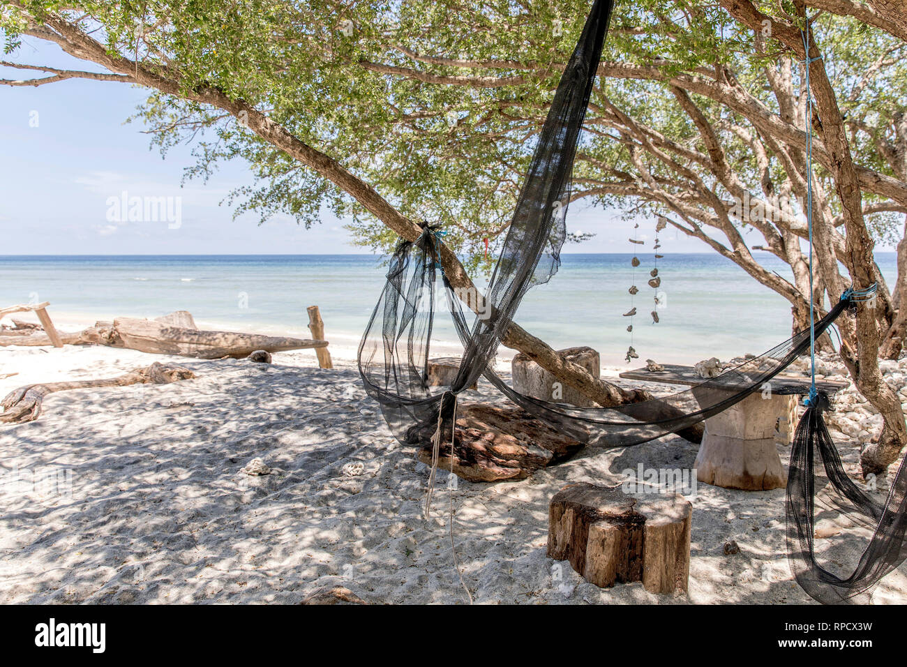 Swing on tropical beach in indonesia Gili Trawangan. Stock Photo