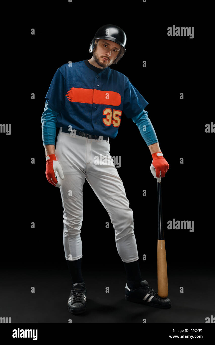 Hitter posing on black background Stock Photo