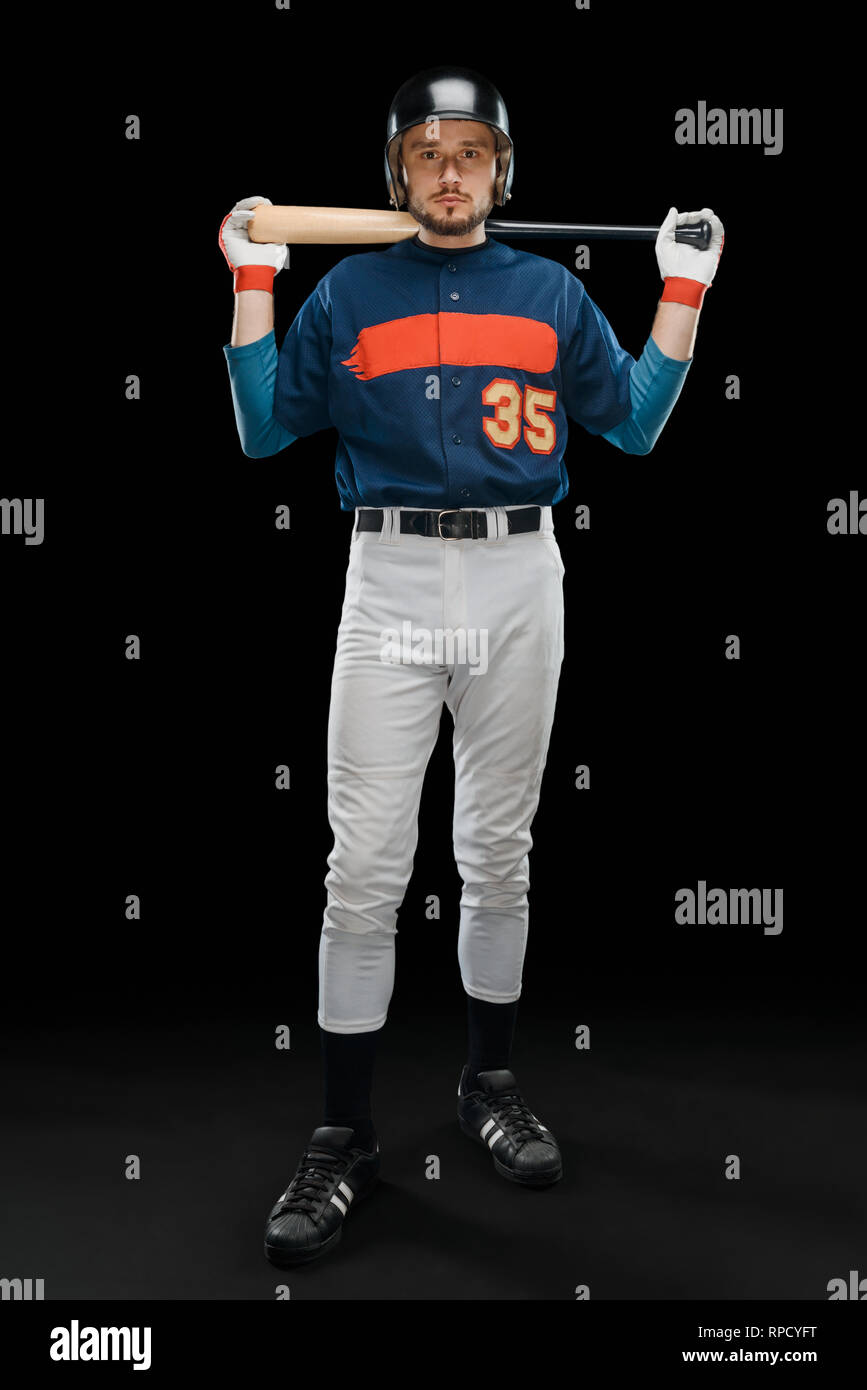 Baseball player posing for the camera Stock Photo - Alamy