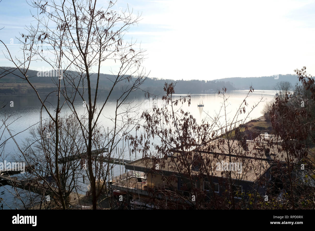 Essen, North Rhine-Westphalia, Germany - Sailboat on the Baldeneysee in Essen in winter, Essen, Nordrhein-Westfalen, Deutschland - Segelboot auf dem B Stock Photo