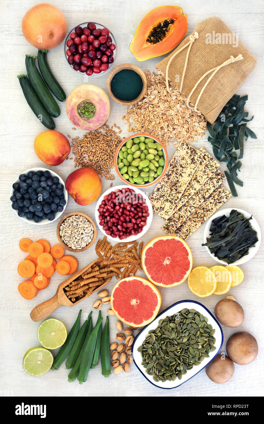 High fibre food for good health with fruit, vegetables, seeds, nuts ...