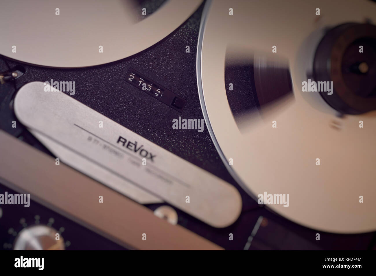 Emphasised tape counter with spinning spool on a Revox B77 reel to reel