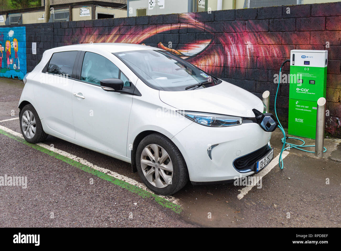 Electric car being charged at an electric car charging point bantry west cork ireland Stock Photo