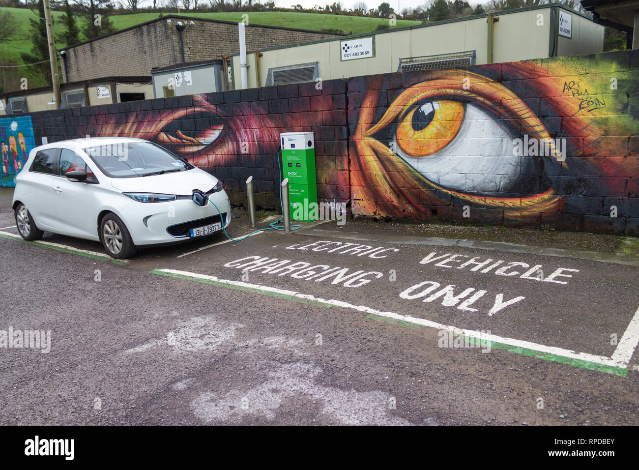 Electric car being charged at an electric car charging point bantry west cork ireland Stock Photo