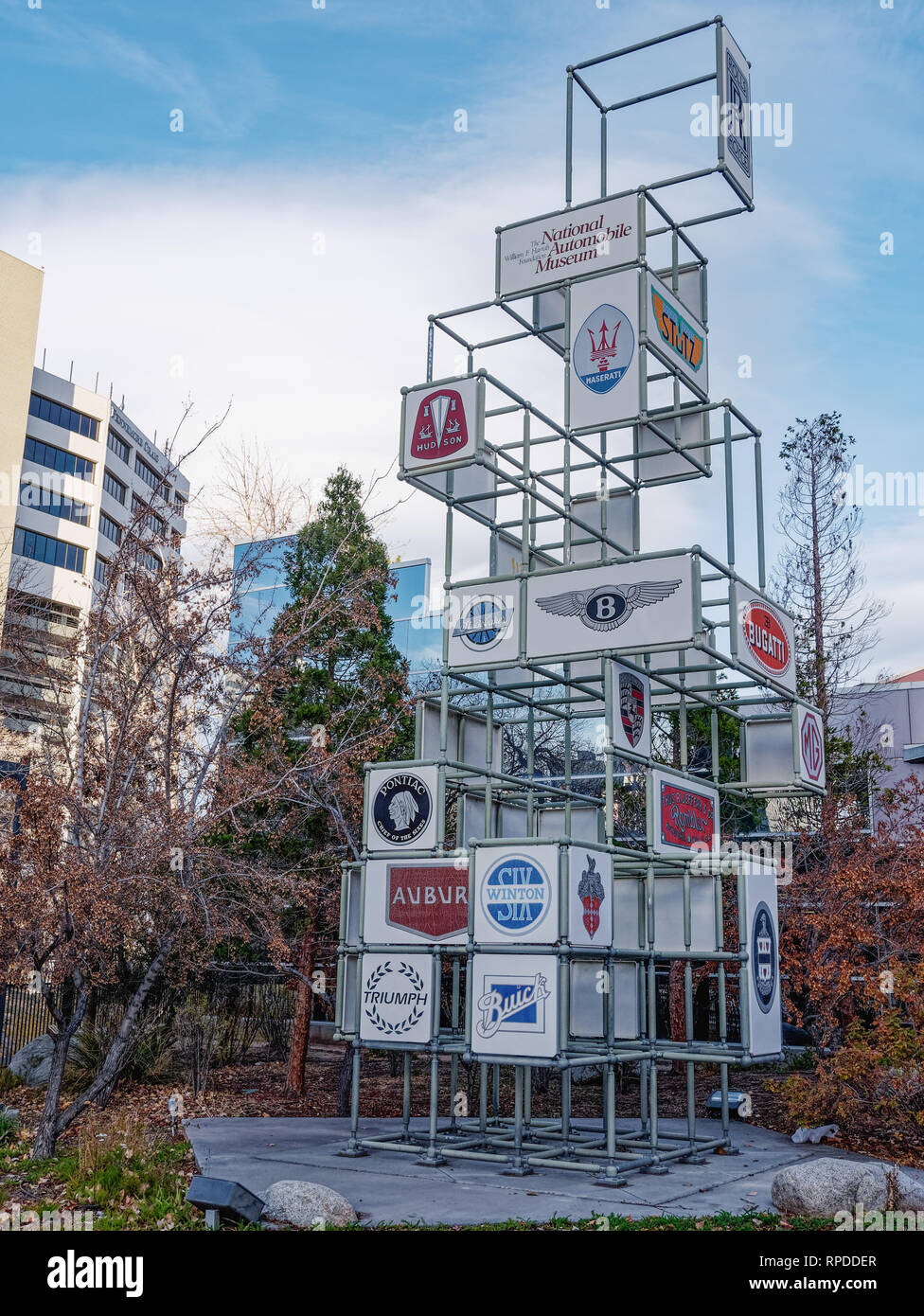 Reno, Nevada - November 25, 2016: This sign outside the William F. Harrah Foundation National Automobile Museum shows the logos of many auto manufactu Stock Photo