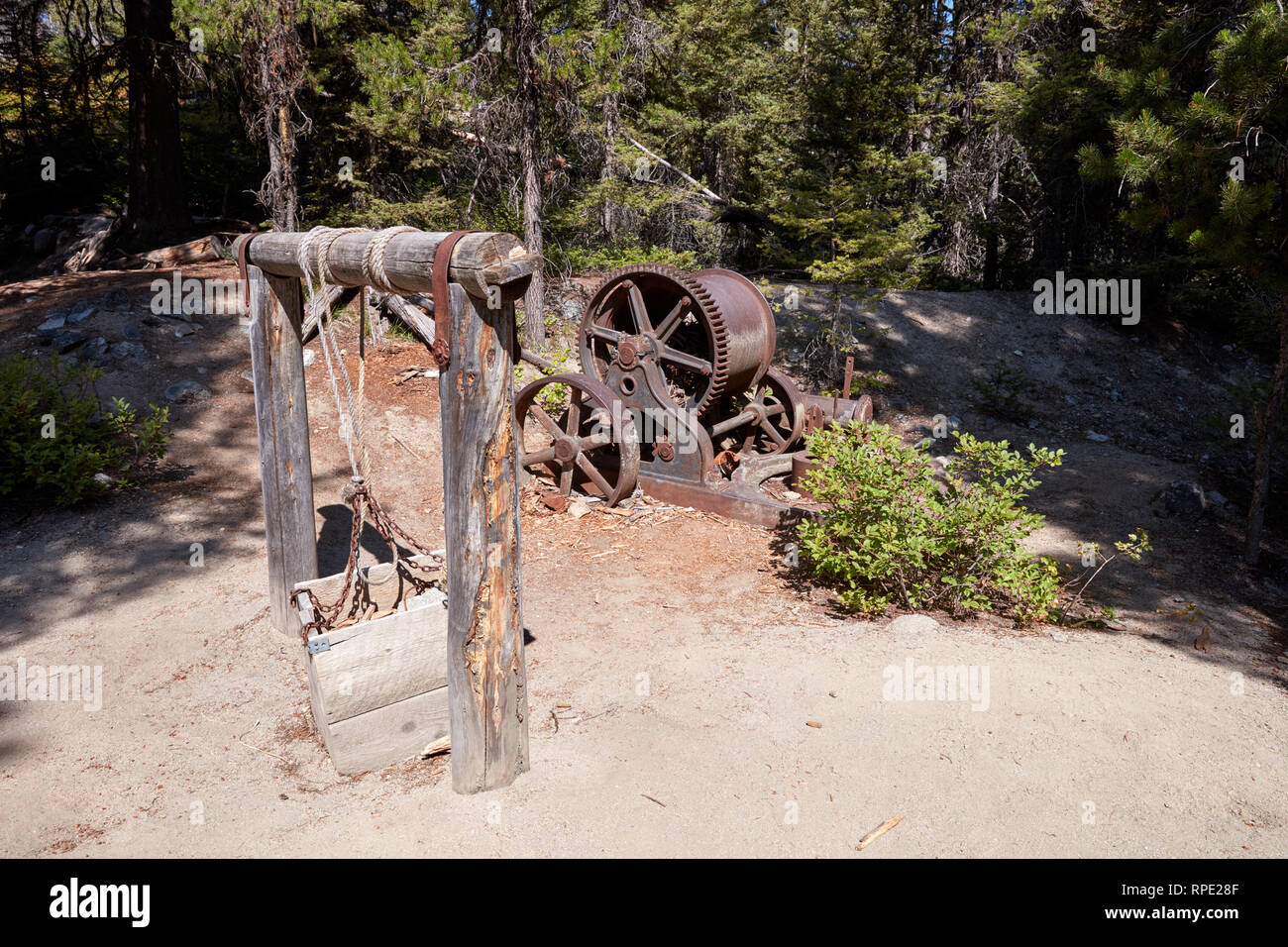 Wooden windlass and remnants of a steampowered winch used to mine gold