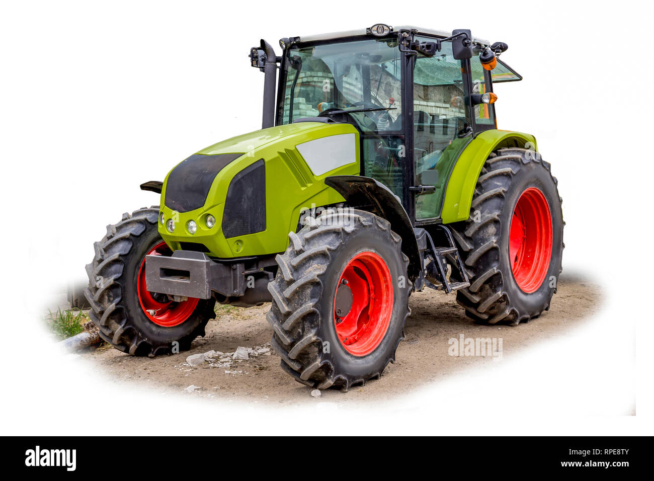 Powerful tractor for various agricultural work. General view of the agricultural machine. Necessary equipment for a dairy farm. The isolated image. Stock Photo