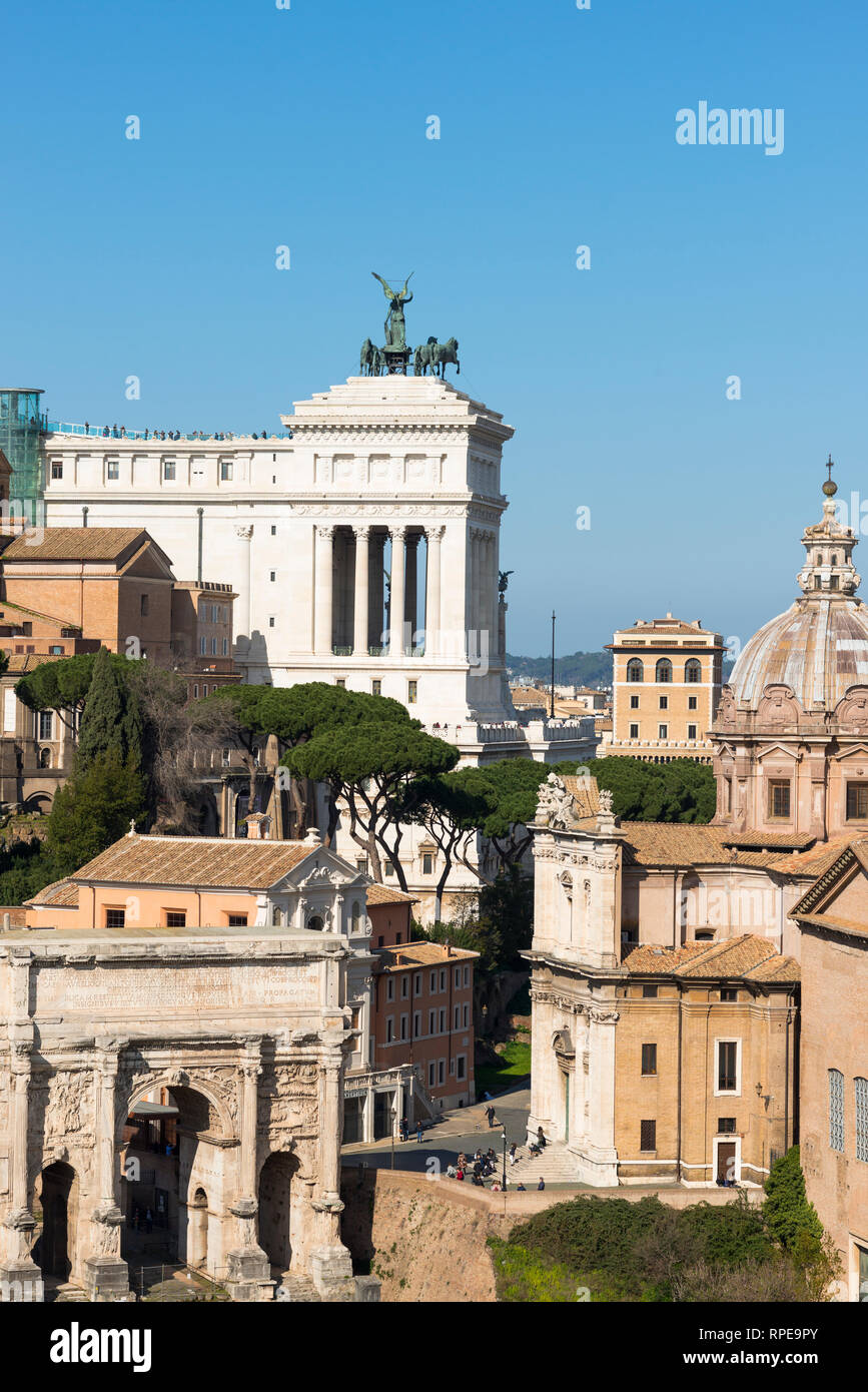 Rome city skyline with the Roman Forum, Monument to Vittorio Emanuele II, Church of Santi Luca e Martina and Arch of Septimius Severus. Rome. Italy. Stock Photo