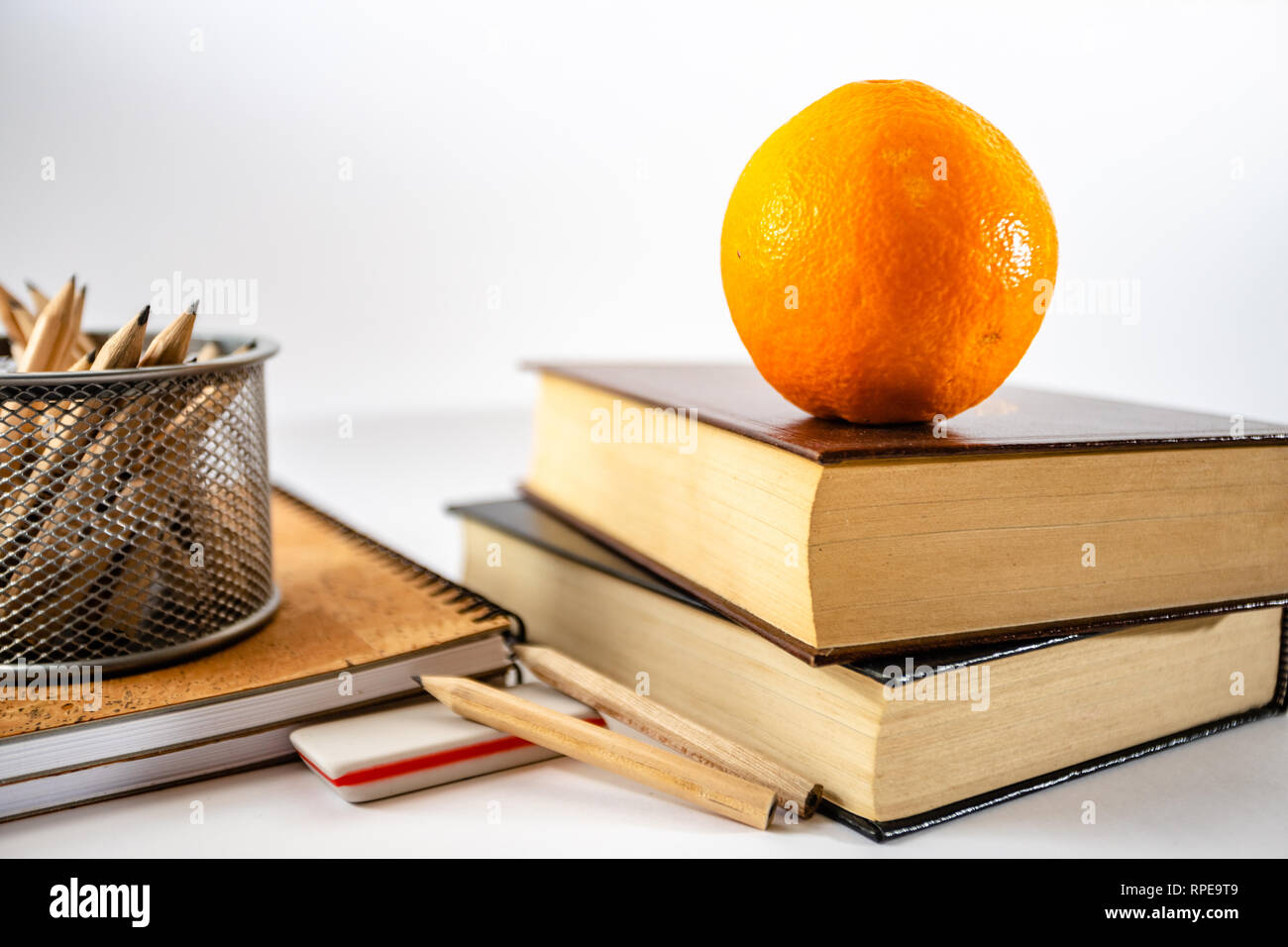 School supplies on table in white background. Stock Photo
