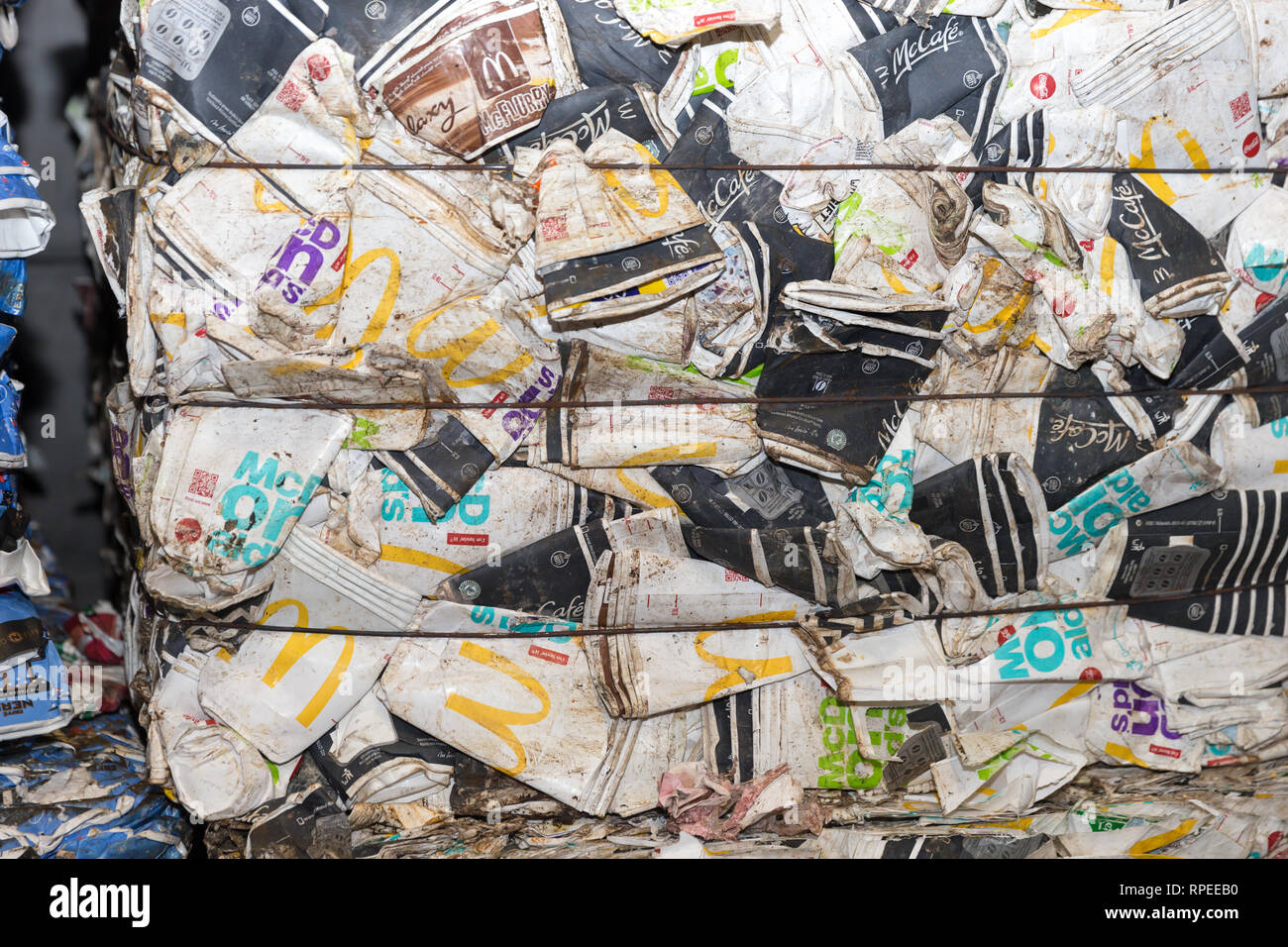 A pile of currently nonrecyclable paper coffee cups from a selection
