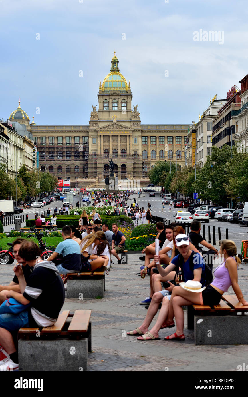 Summer view up the Wenceslas Square half mile long 14th century park with Narodni national museum at end, Prague Stock Photo