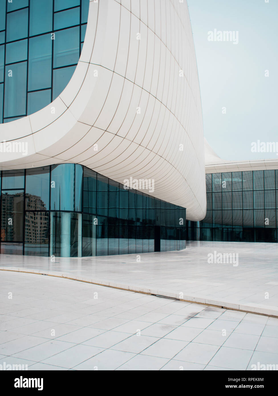 BAKU, AZERBAIJAN - APRIL 28, 2018: The Heydar Aliyev center in Baku. Modern architecture, futuristic white building smooth shapes. Stock Photo