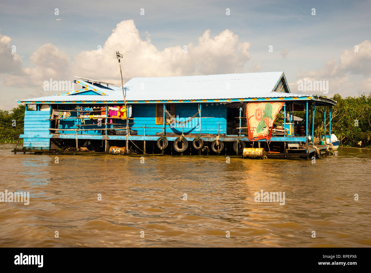 Vietnamese Cambodian floating village vernacular architectural home in Chong Khneas on Tonle Sap Lake. Stock Photo