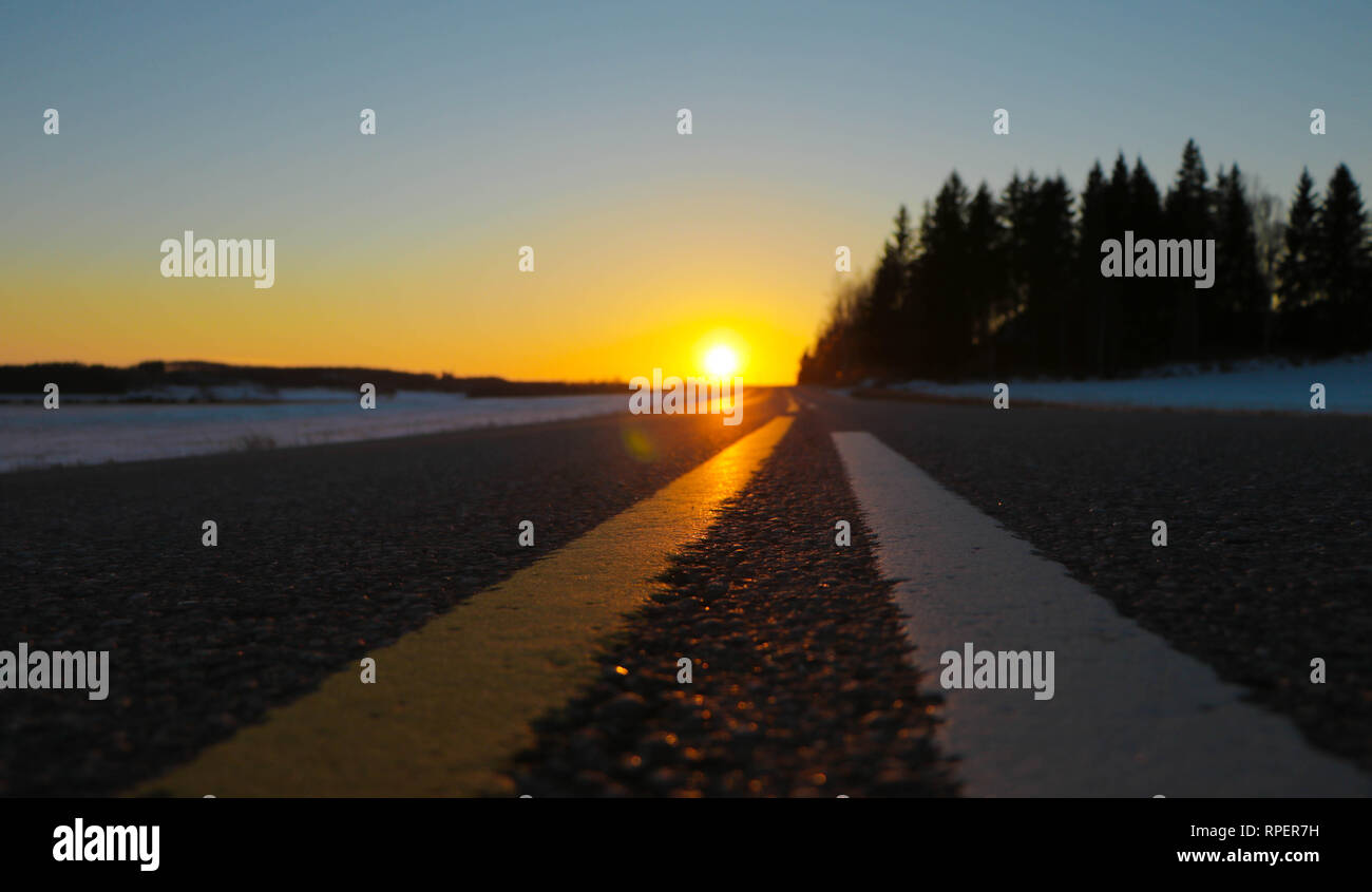 sun-setting-in-the-end-of-the-road-stock-photo-alamy