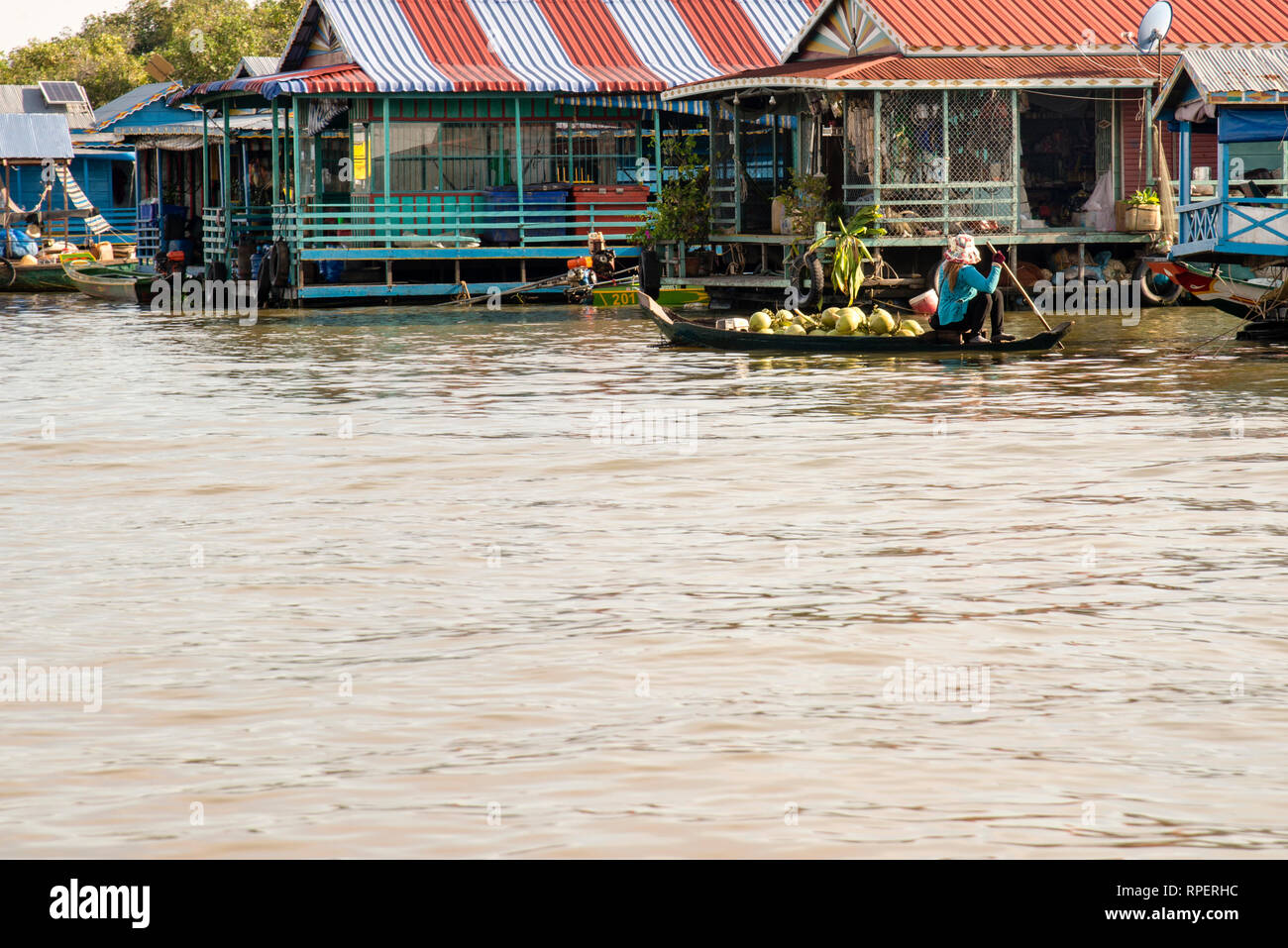 Floating village of Chong Khneas on Tonle Sap Lake in Cambodia, a subsistence community of ethnic Vietnamese considered non-immigrant foreigners. Stock Photo